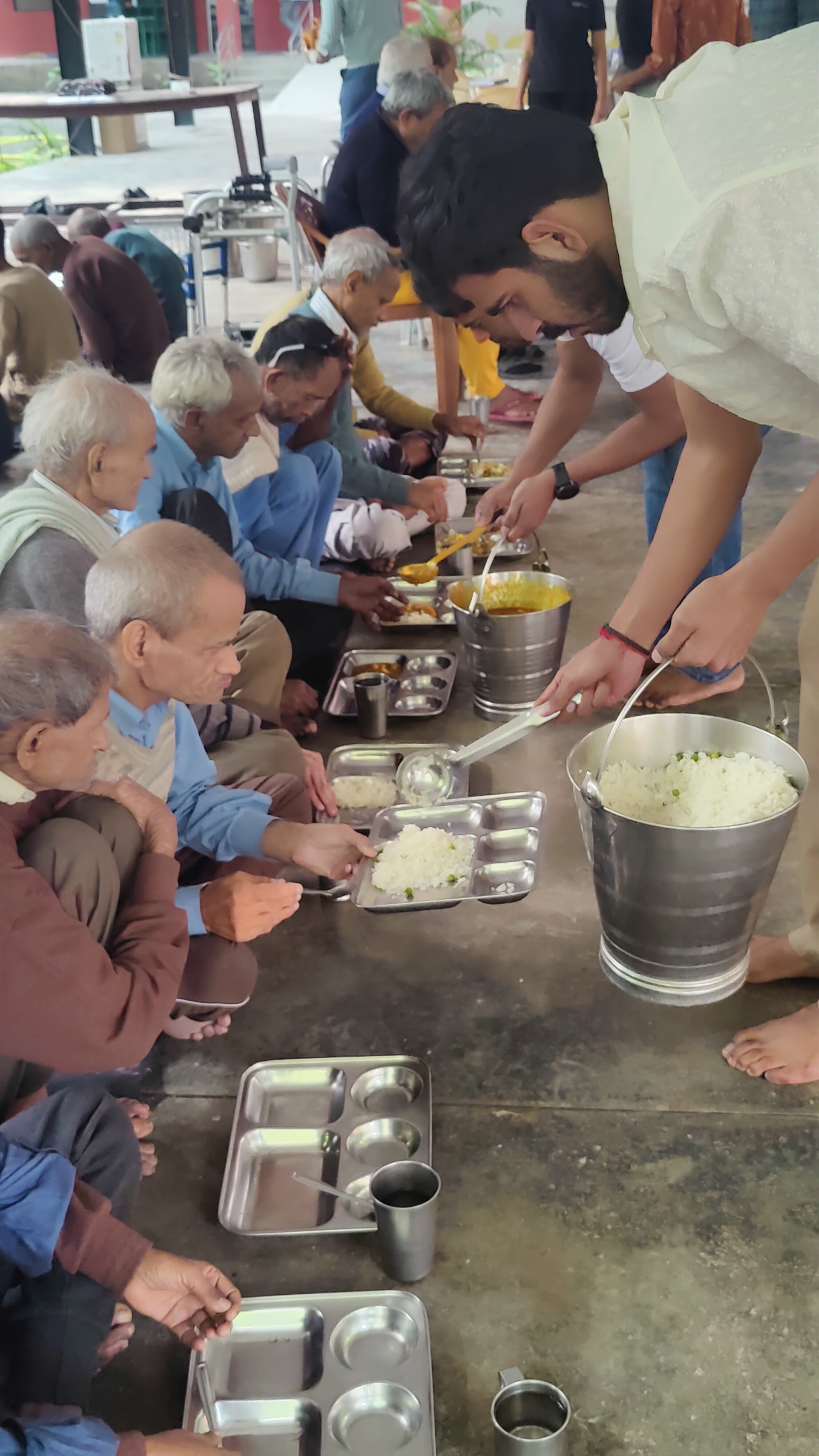 Volunteers repainting a rural school classroom
